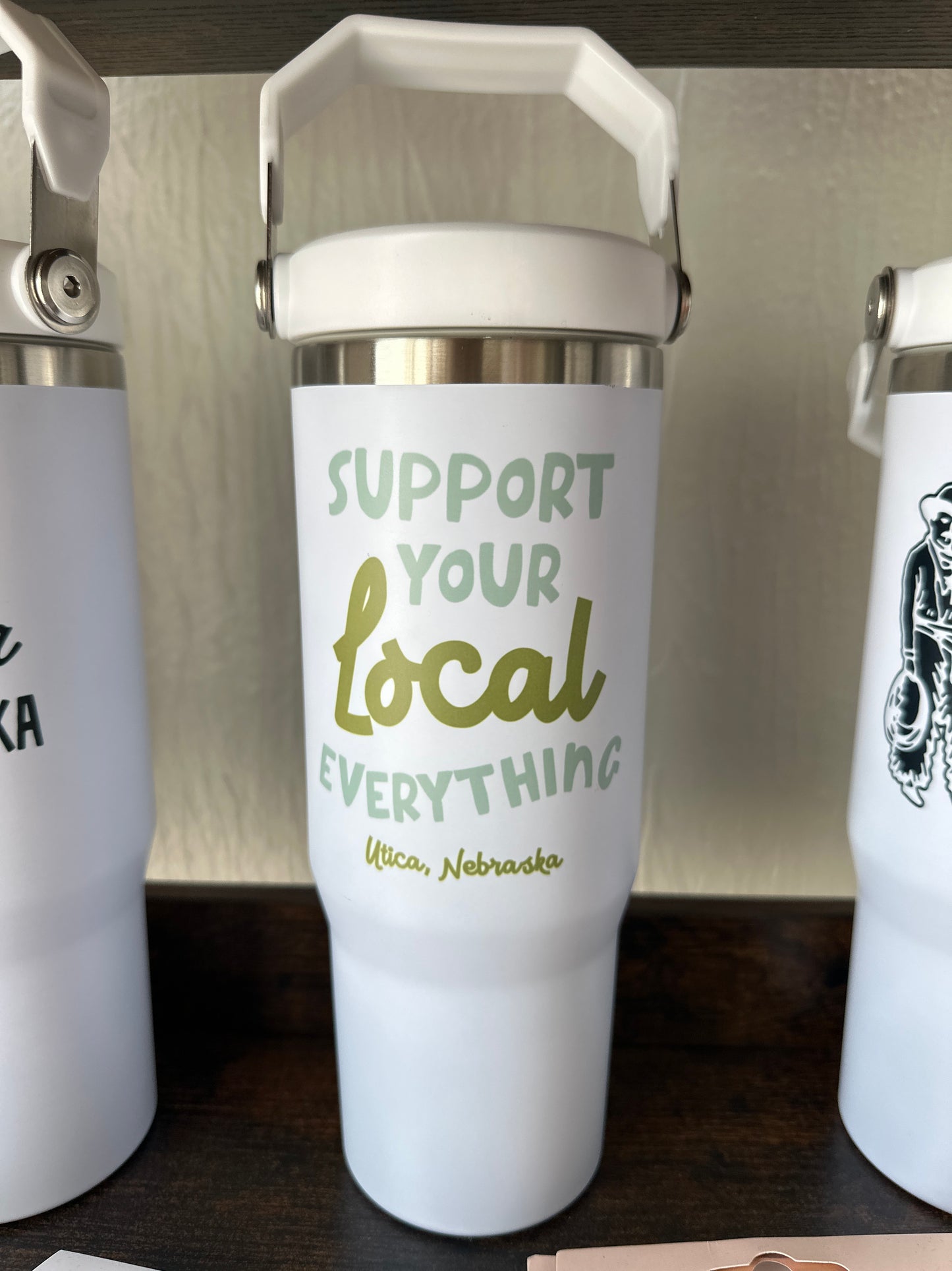 Support Utica flip lid tumbler