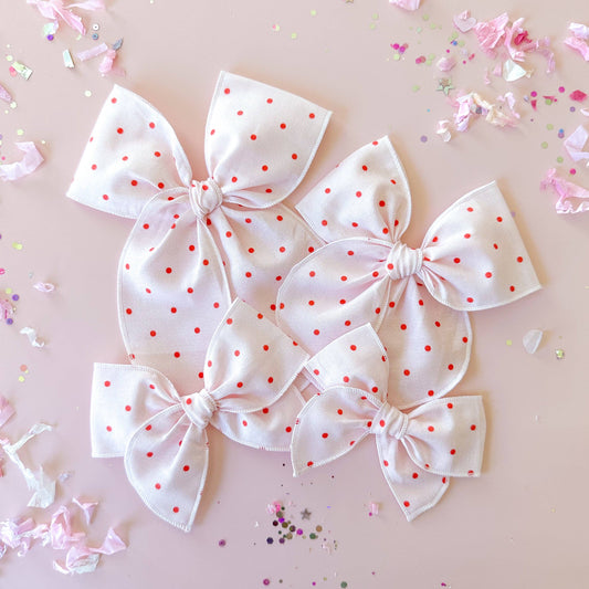 light pink red dot bow