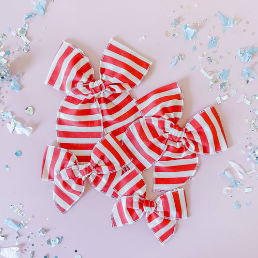 red and white striped bow