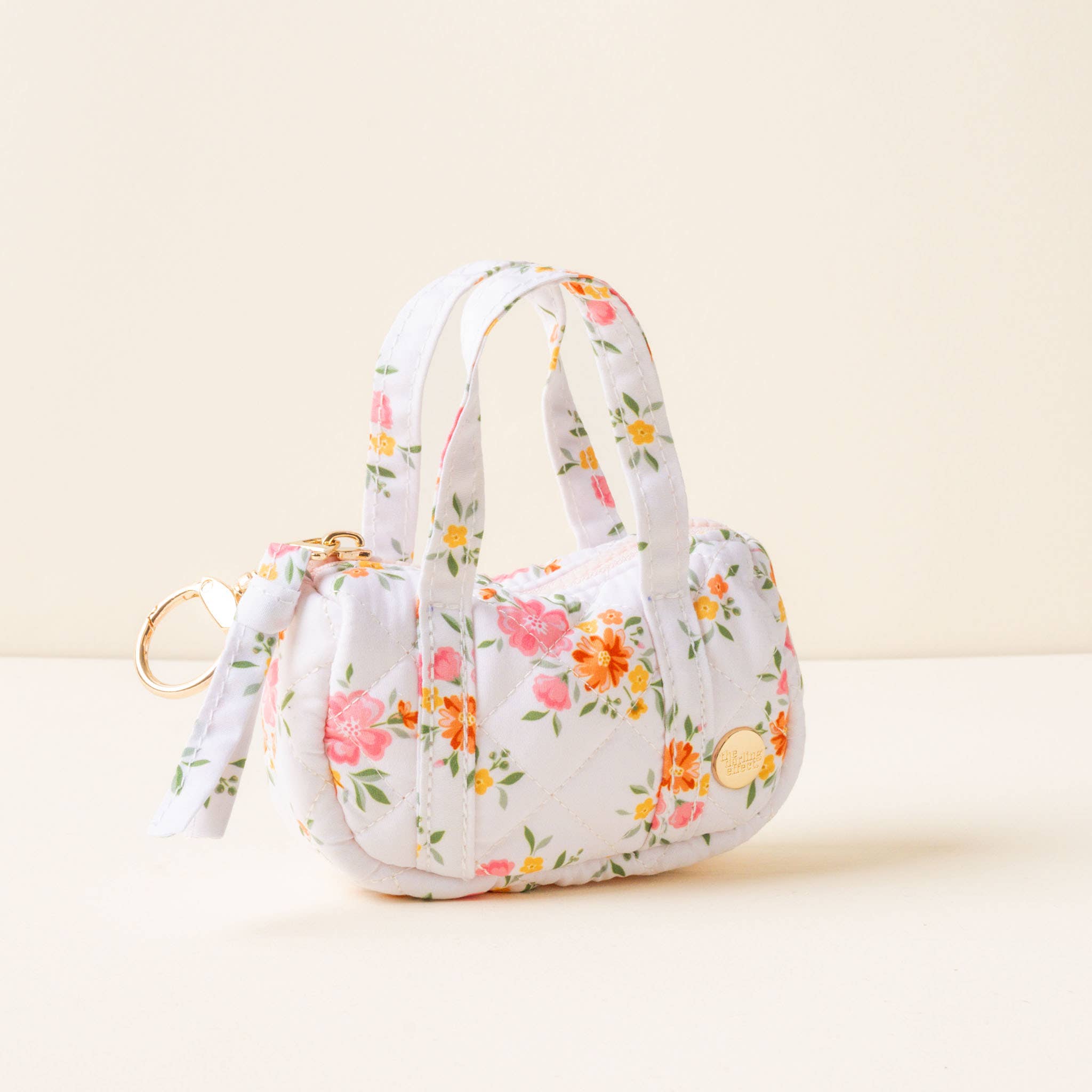 itty bitty quilted duffle bag charm in endless daydream cream