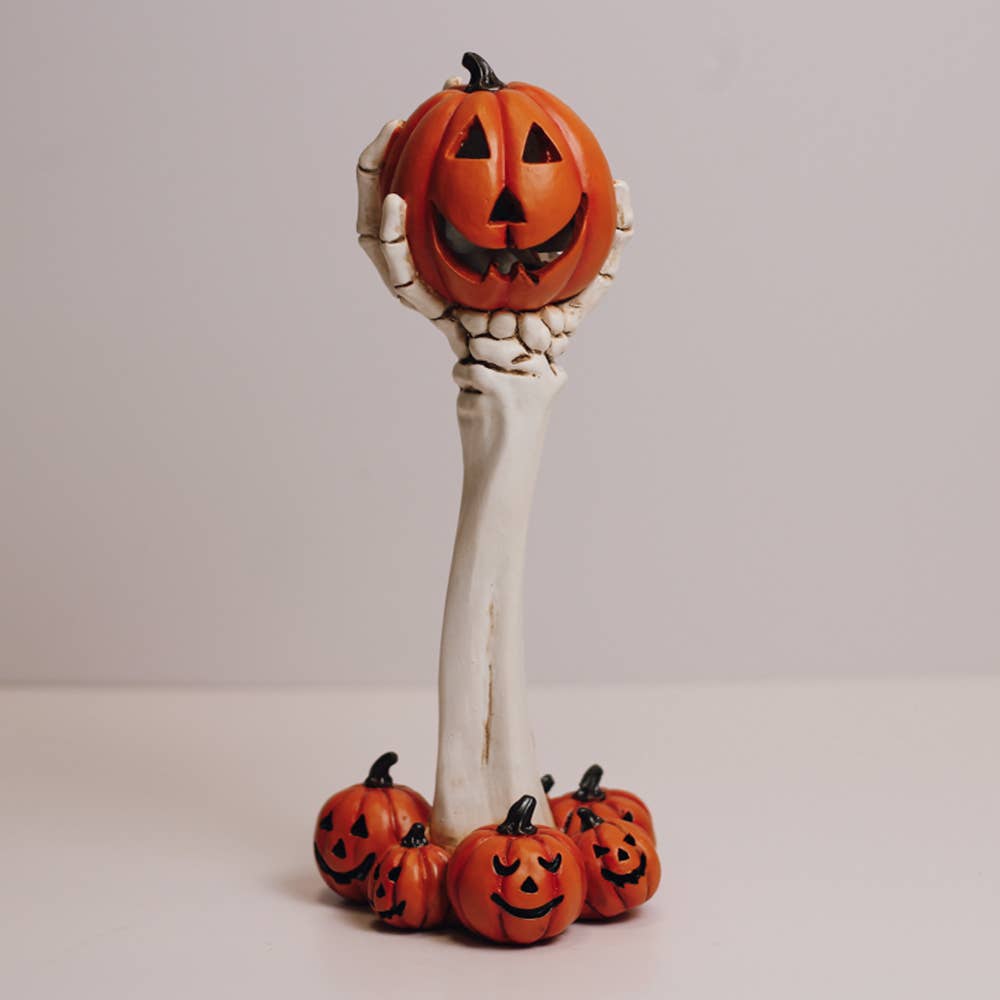 pumpkin skull hand